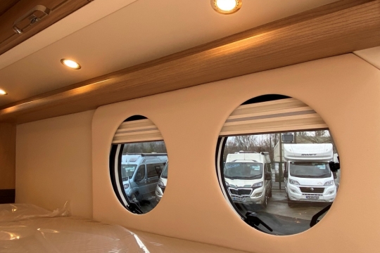 malibu-first-class-two-rooms-skyview-interior-portholes-inside.jpg