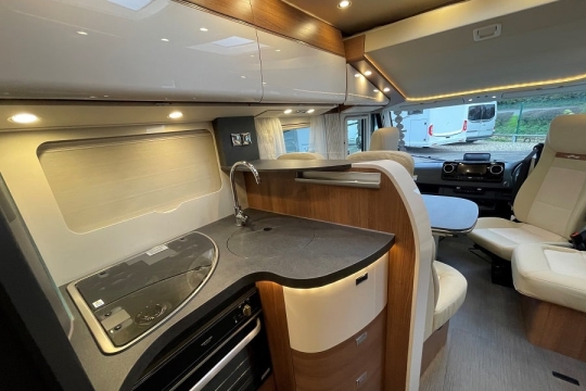 carthago-c2-tourer-I- 145-RB-LE-interior-kitchen-to-front.jpg