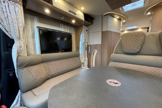 carthago-c1-tourer-interior-lounge-tv.jpg