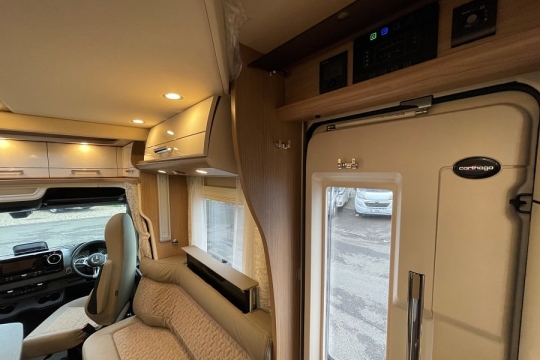 carthago-c1-tourer-interior-tv-closing.jpg