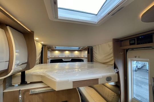 carthago-c1-tourer-interior-drop-down-bed.jpg