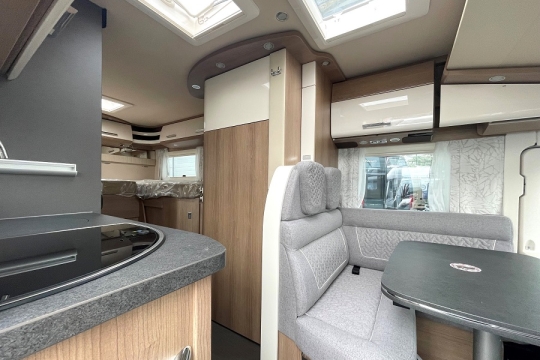 carthago-c1-tourer-141-kb-le-interior-door-to-rear.jpg