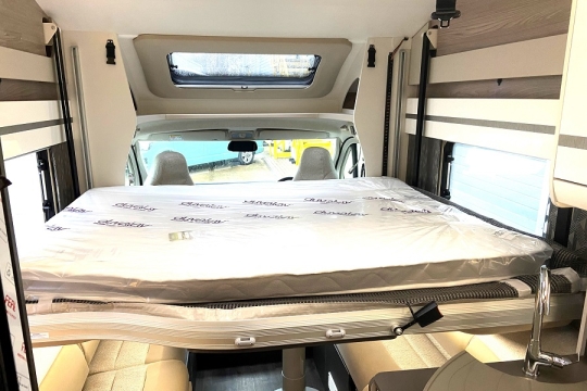 swift-escape-640-interior-drop-down-bed.jpg