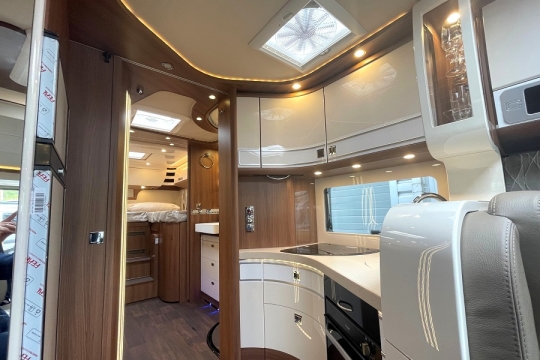 carthago-e-line-i-61-xl-le-interior-kitchen-to-rear.jpg