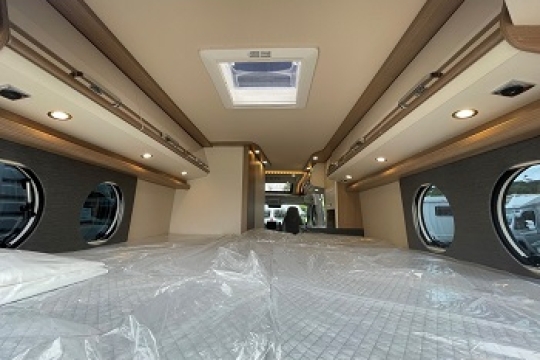 small-malibu-van-first-class-180-interior-bed-to-front - Copy.jpg
