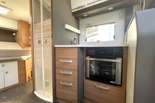 adria-coral-670-sc-plus-interior-kitchen-to-rear.jpg