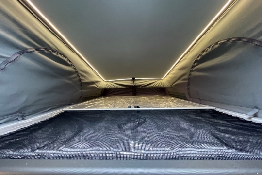 swift-carrera-244-interior-pop-top-bed.jpg