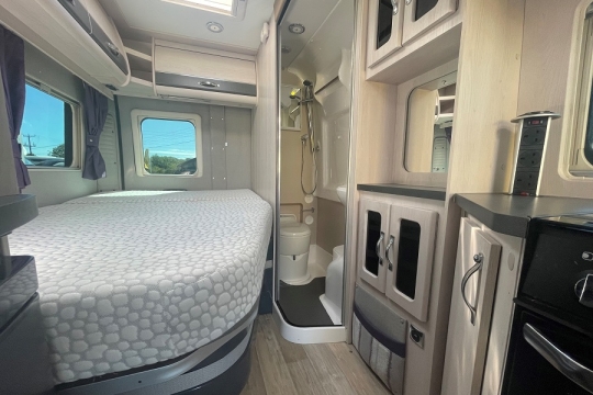 auto-sleepers-kingham-interior-bed-and-bath.jpg