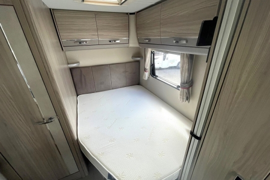 elddis-majestic-155-interior-french-bed.jpg