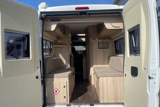 auto-trail-tribute-670-interior-rear-doors-open.jpg