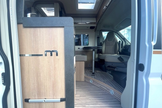 malibu-van-compact-540-db-2025-model-interior-from-side-door.jpg