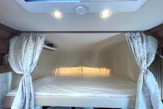 carthago-c2-tourer-i-145-rb-le-interior-drop-down-bed.jpg