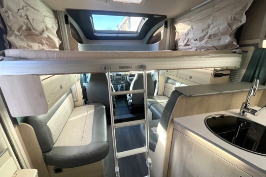 auto-trail-f60-interior-drop-down-bed.jpg