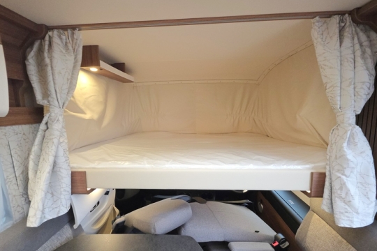 Carthago-C2-tourer-I-143-KB-LE-Interior-Drop-Down-Bed.jpg