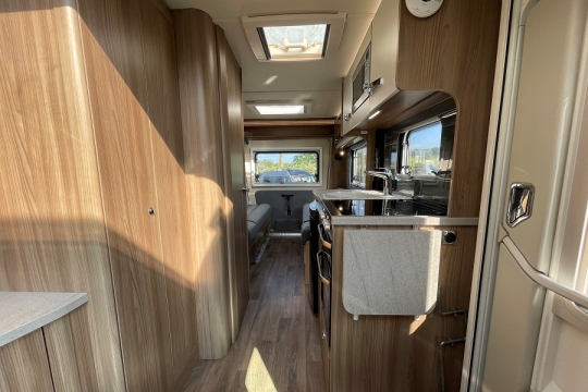swift-rio-320-interior-kitchen-to-rear.jpg