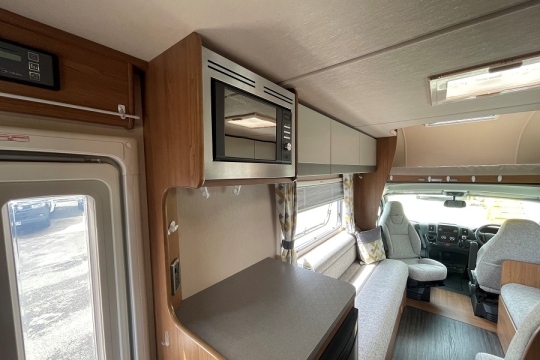 auto-trail-tribute-615-interior-microwave-to-front.jpg