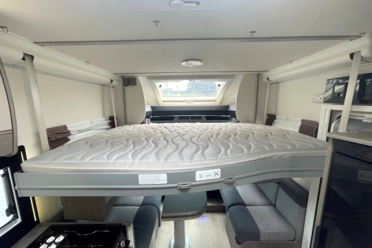 chausson-titanium-768-xlb-interior-drop-down-bed.jpg