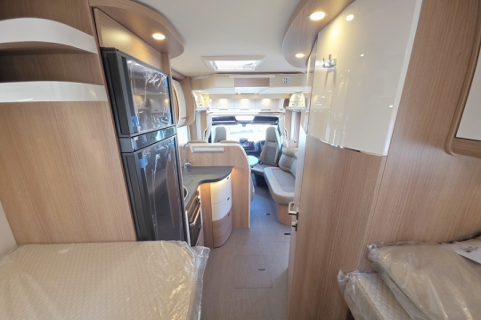 Carthago-C1-Tourer-T-148-KB-LE-H-Interior-Rear-to-Front.jpg