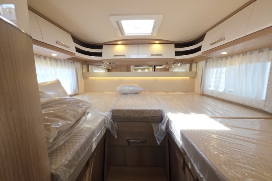 Carthago-C1-Tourer-T-148-KB-LE-H-Interior-Bed.jpg