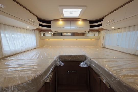 Carthago-C1-Tourer-T143-KB-LE-Interior-Bed.jpg
