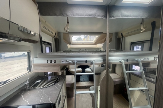 benimar-mileo-282-interior-front-drop-down-bed.jpg