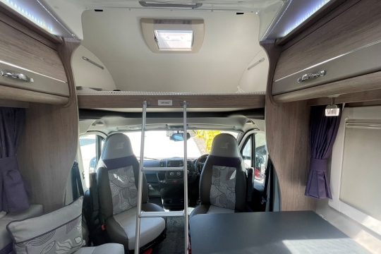 auto-sleepers-nuevo-ek-es-interior-overcab-bed-2.jpg
