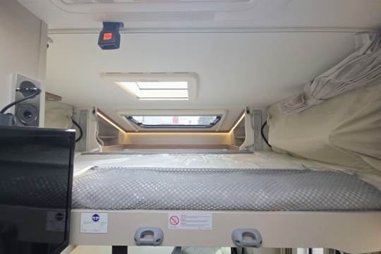 Dethleffs-Trend-T-6557-Interior-Drop-Down-Bed.jpg