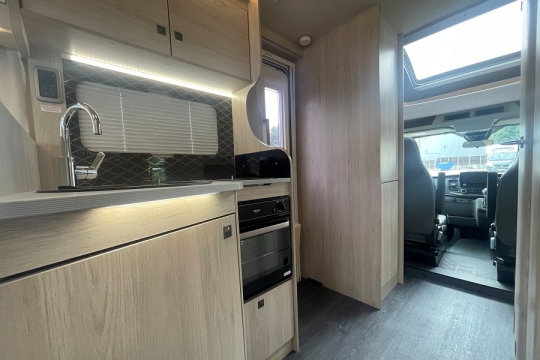 auto-trail-f68-interior-kitchen-to-cab.jpg