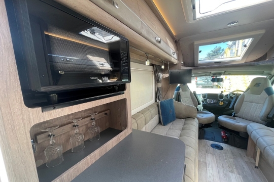 auto-sleepers-nuevo-ek-plus-interior-microwave-to-front.jpg