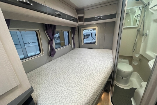 auto-sleepers-kingham-interior-fixed-bed.jpg