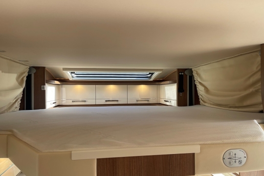 carthago-t148-interior-drop-down-bed.jpg