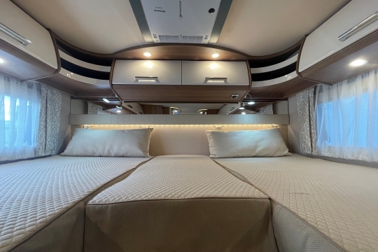 carthago-t148-interior-fixed-bed.jpg